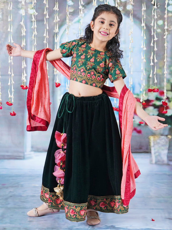 Girl Bageecha Floral Thread work Blouse with Velvet Lehenga and Sequin moti work Dupatta, accompanied with Hand made tassel and Ghungroo work in Green
